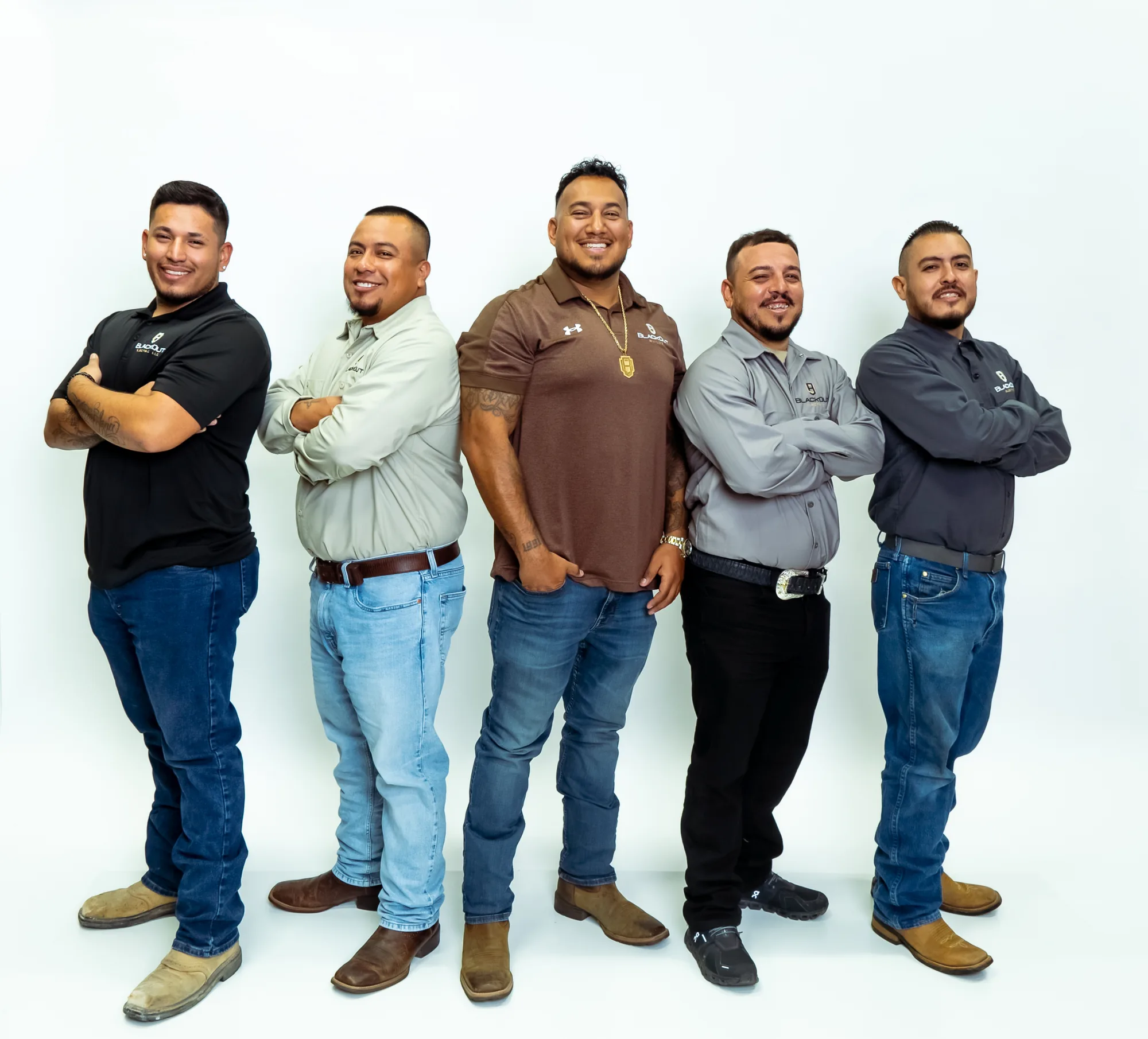 The Blackout Electric crew, five techs in company shirts